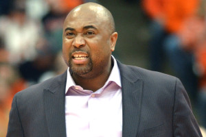 St. John's assistant coach Rico Hines reacts from the sideline during the first half against Syracuse in an NCAA college basketball game in Syracuse, N.Y., Sunday, Feb. 10, 2013. Hines filled in for head coach Steve Lavin who was absent due to his father passing away. Syracuse won 77-58. (AP Photo/Kevin Rivoli)